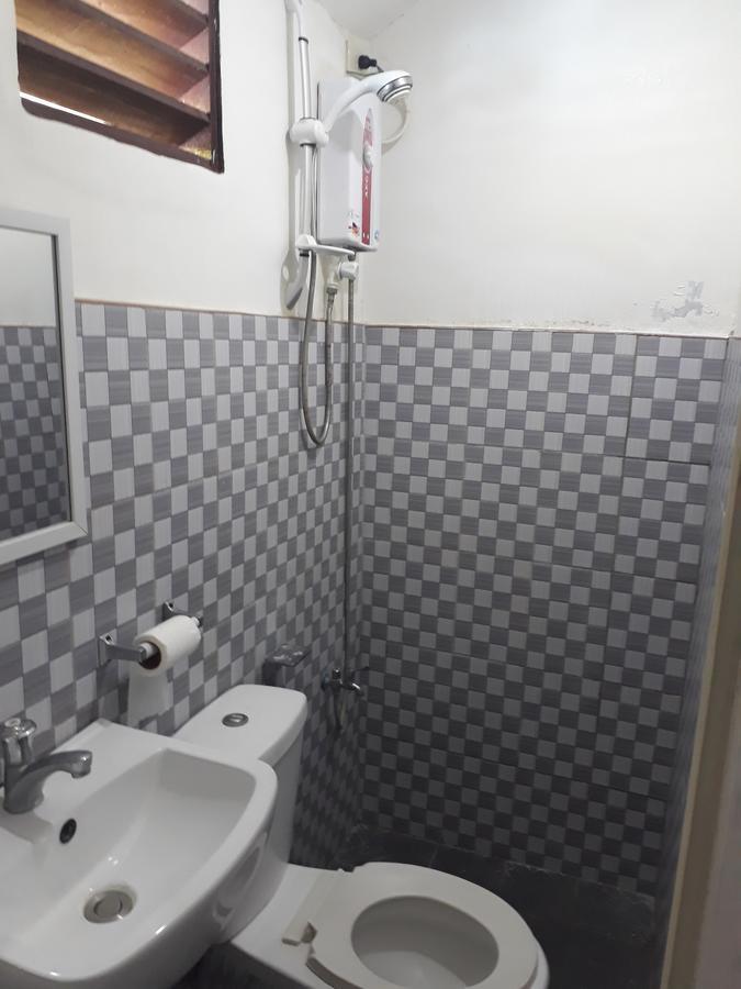 Adrian Travellers Inn Эль-Нидо Экстерьер фото