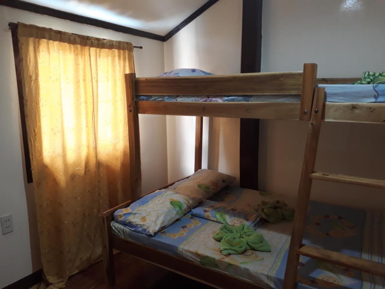 Adrian Travellers Inn Эль-Нидо Экстерьер фото