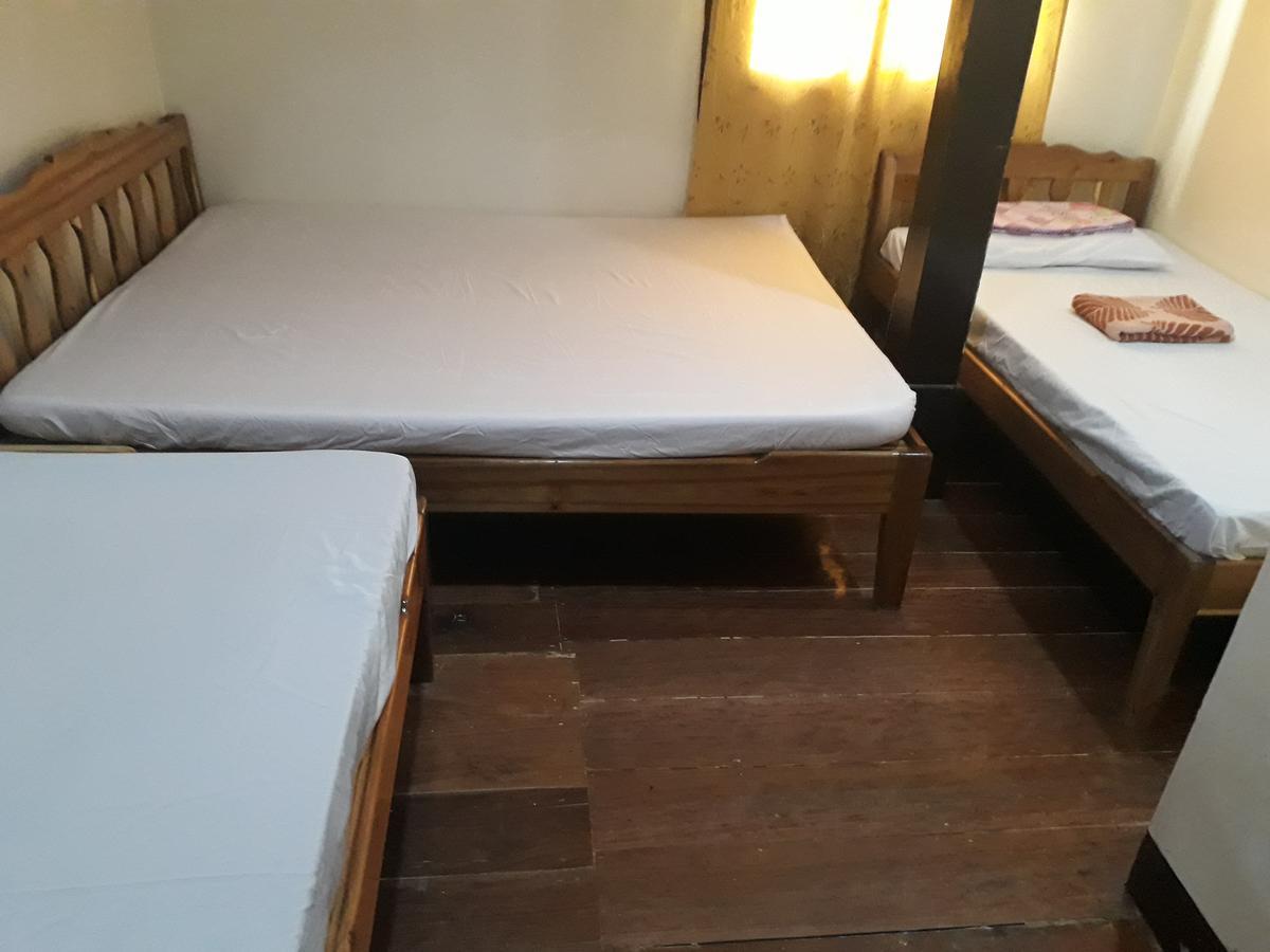 Adrian Travellers Inn Эль-Нидо Экстерьер фото